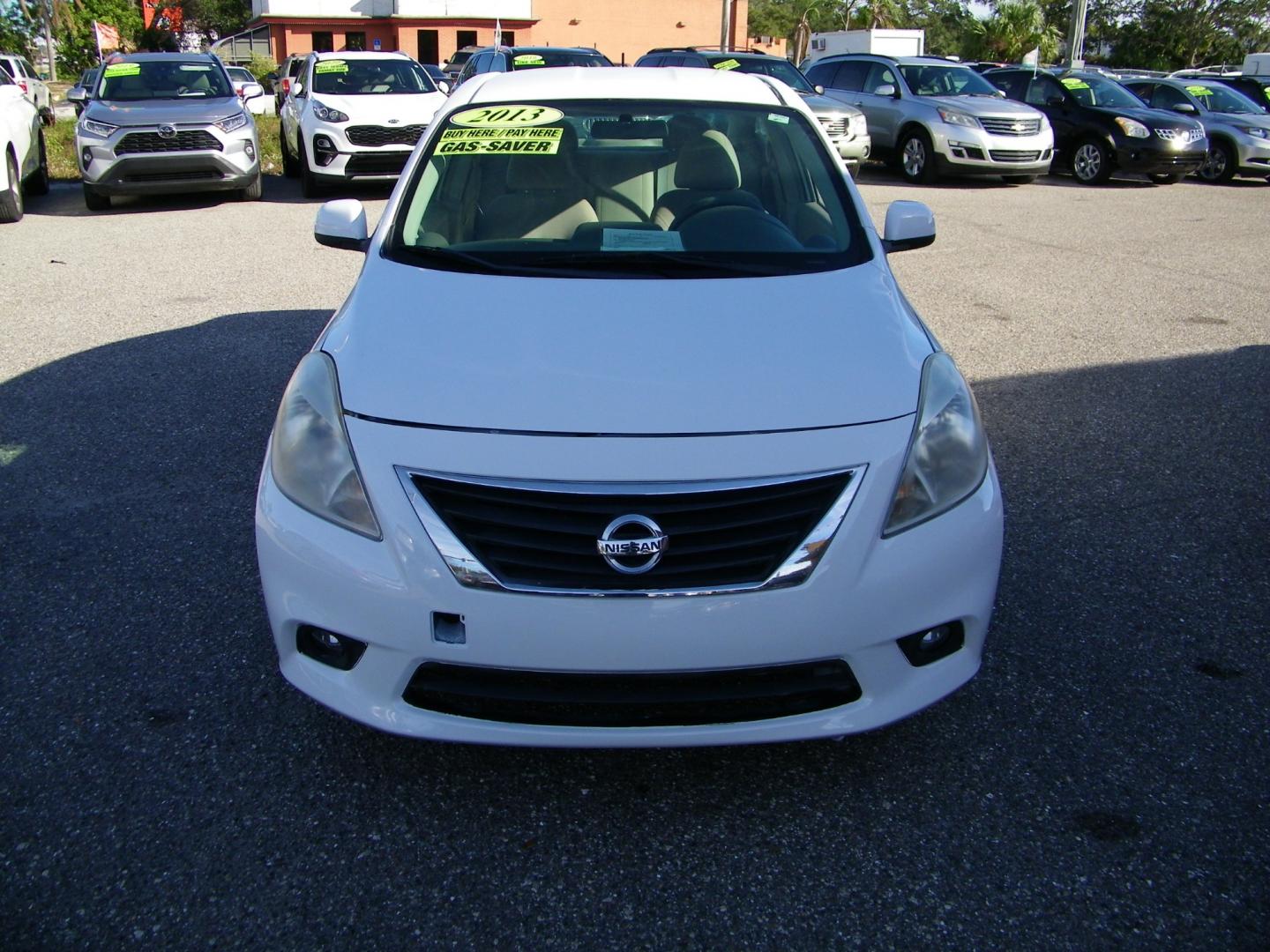 2012 White /Black Nissan Versa SV (3N1CN7AP3CL) with an L4, 1.6L engine, Automatic transmission, located at 4000 Bee Ridge Road, Sarasota, FL, 34233, (941) 926-0300, 27.298664, -82.489151 - Photo#1